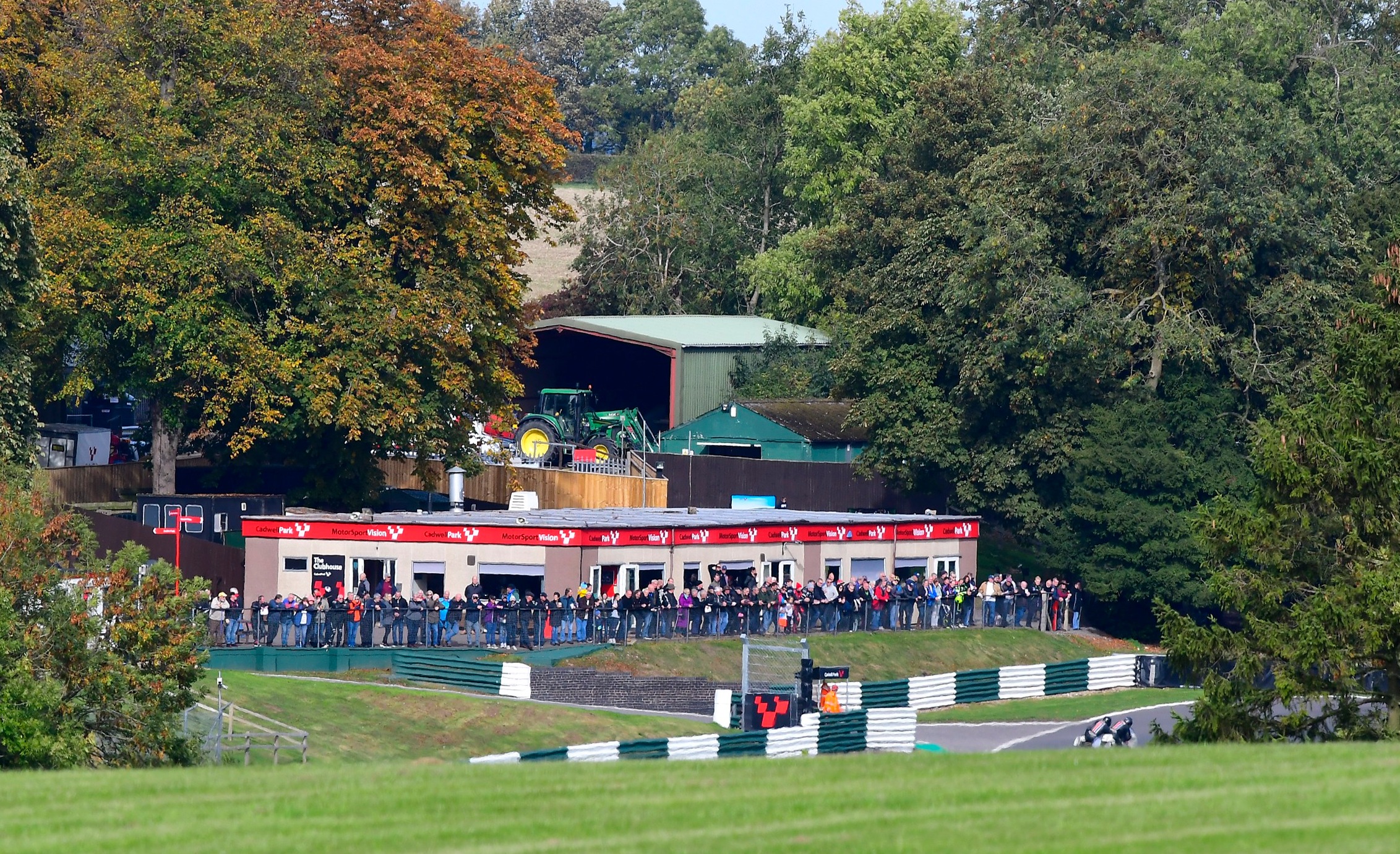 Cadwell Park race day — the crowd watches from the clubhouse